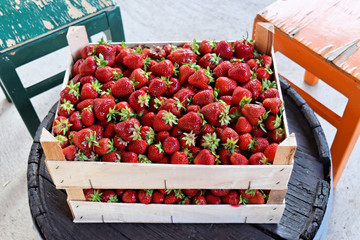 Ripe strawberries in wooden boxes © zvonkodjuric