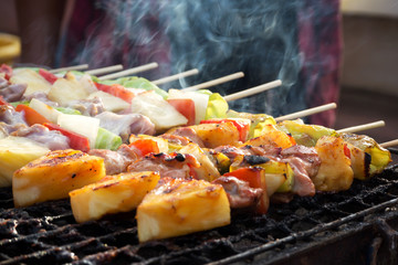 Barbecue stick grilling. Street food in Thailand. Meal and easy eat.