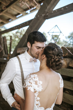 Bride and groom kissing 