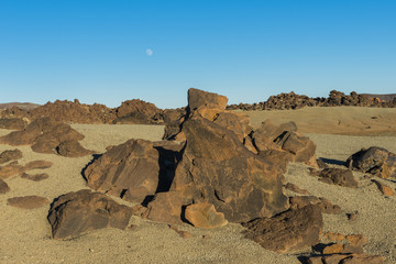 Fototapeta na wymiar Vulcano Landscape with Moon and Rocks