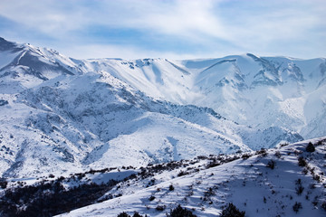 Obraz premium Snowy mountains of Tien Shan in winter