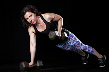 Female Weightlifter Plank Dumbell Row