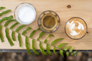 The ingredients of coffee on a wooden desk