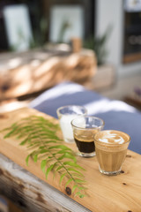 The ingredients of coffee on a wooden desk