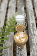 The ingredients of coffee on a wooden desk