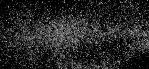 White sugar closeup isolated on black background and texture, top view