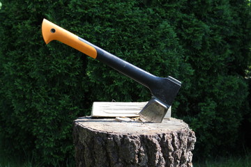 ax stuck in wood block
