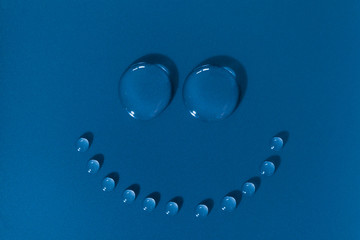 Fototapeta premium Happy face made of water drops