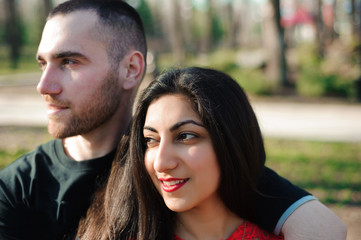 Fototapeta premium Man and woman in love posing in the park