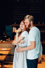 couple posing in the doorway