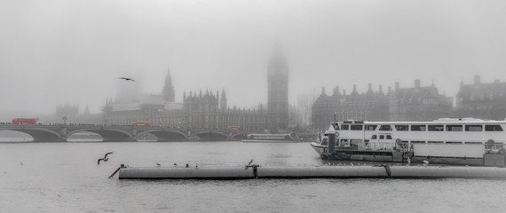 London River Thames Westminster riverscape during foggy weather on a partly de-saturated background