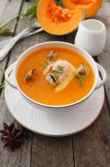Pumpkin soup with seafood