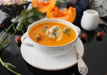 Pumpkin soup with seafood