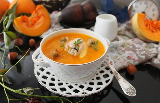 Pumpkin soup with seafood