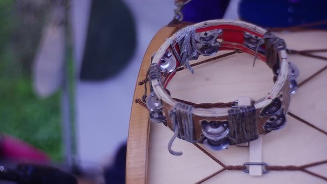 a Girl is Beating a Rhythm on a Big Drum