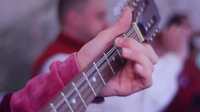 Troubadour Entertains Crowd at Historic Festival