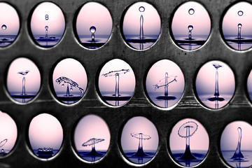 Collage of water drop collisions displayed through a metal grill with circular cutouts
