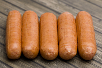 Hot Dogs Isolated on a Wooden Table