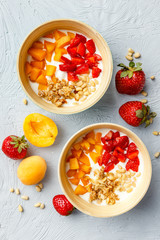 Homemade yogurt with granola, apricot and pine nuts