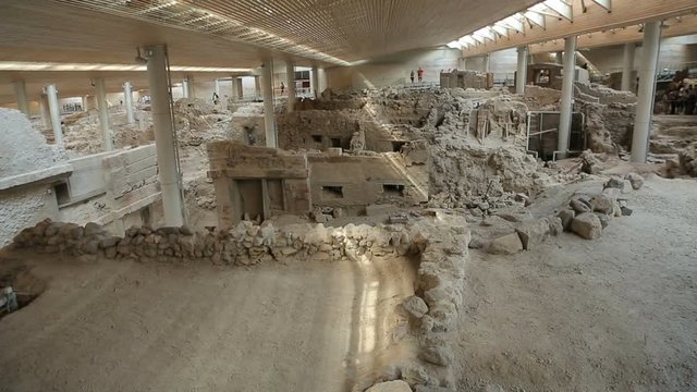 Remains of ancient village of Akrotiri under excavation, vertical panorama view