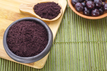 Fruits and acai powder originating from the Amazon  (Euterpe oleracea)