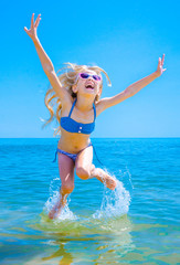 Girl in a blue swimsuit