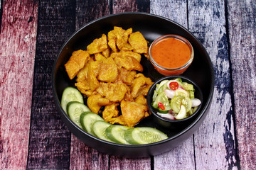 Charcoal boiled ,Pork satay served with side disk.