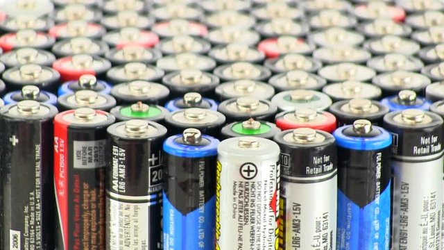 AAA batteries standing on end rotating slowly