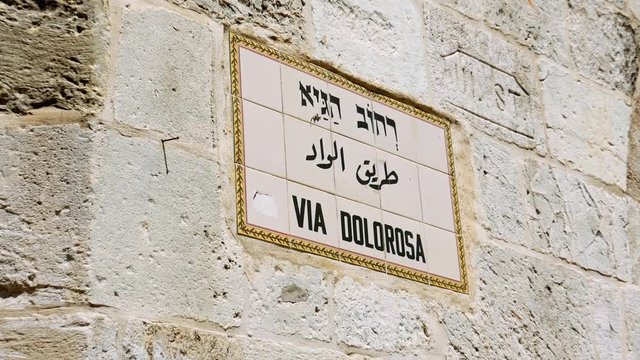 Via Dolorosa street sign in Jerusalem old city. Via Dolorosa is a sacred place for the all Christians in the world. Located in Holy land Jerusalem. Zoom shot.