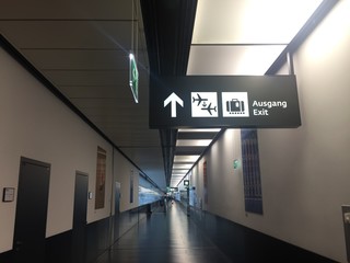 Airport exit sign. Vienna airport hall. Ausgang. Arrow