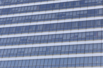Obraz premium Wall of tall building or glass of skyscraper background.