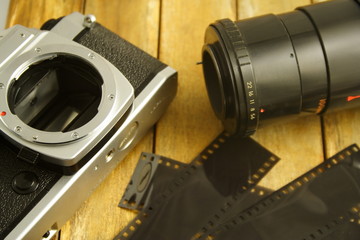 Film Camera with zoom lens and negatives