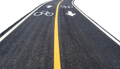 Asphalt bicycle road with yellow line