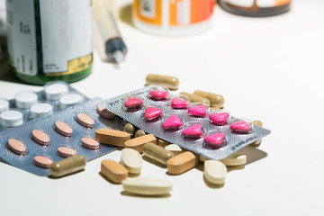 Packaging of tablets and pills on the table. Medicine