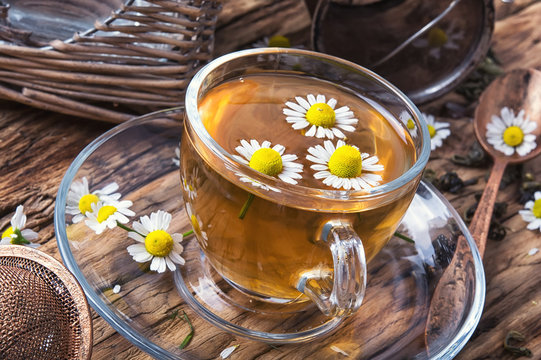 glass of herb tea with chamomile
