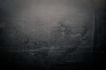 Wooden black surface. The structure of the tree. Top view. Free space.