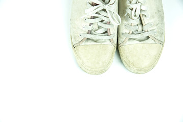 Old  sneakers dirty on white background.