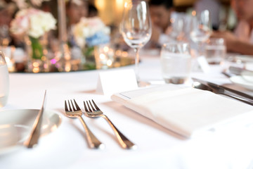 Spoon and fork on the table wedding dinner.