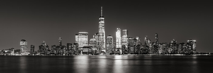 Fototapeta na wymiar Black and White panoramic view of New York City Financial District skyscrapers. Panoramic view of Lower Manhattan