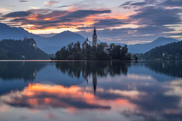 Naklejka na ściany i meble colorful sunrise on lake Bled in Slovenia