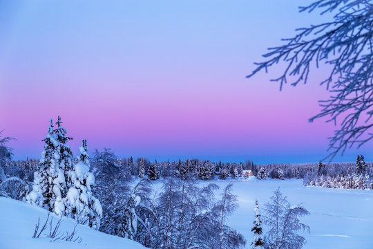 Sunset On A Frozen Lake In Sweden