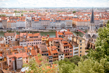 Fototapeta na wymiar Aerial cityscape view with beautiful old buildings and saint George cathedral in Lyon city