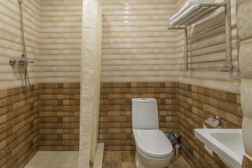 Interior of the bathroom and toilet in the hotel