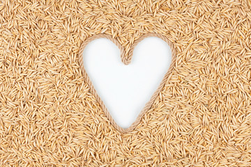 Oat grains and a rope in the shape of a heart with a place for designers.