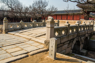 Okcheongyo Bridge which is a stone bridge built in Changgyeonggung palace. South Korea, Seoul.  (Sign board text is "Okcheongyo " name of building)