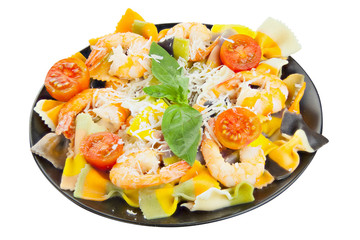 delicious delicious spaghetti with shrimps and basil on  plate