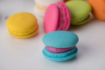 Fototapeta na wymiar Colorful cupcakes and Macaroon on a white plate.