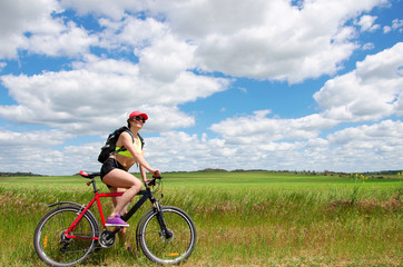 Obraz premium girl on a bicycle