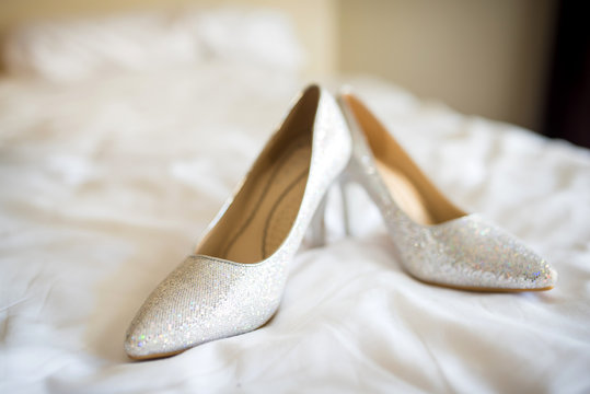 Bridal shoes on the bed