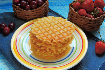 waffles and fruit, strawberries and cherries